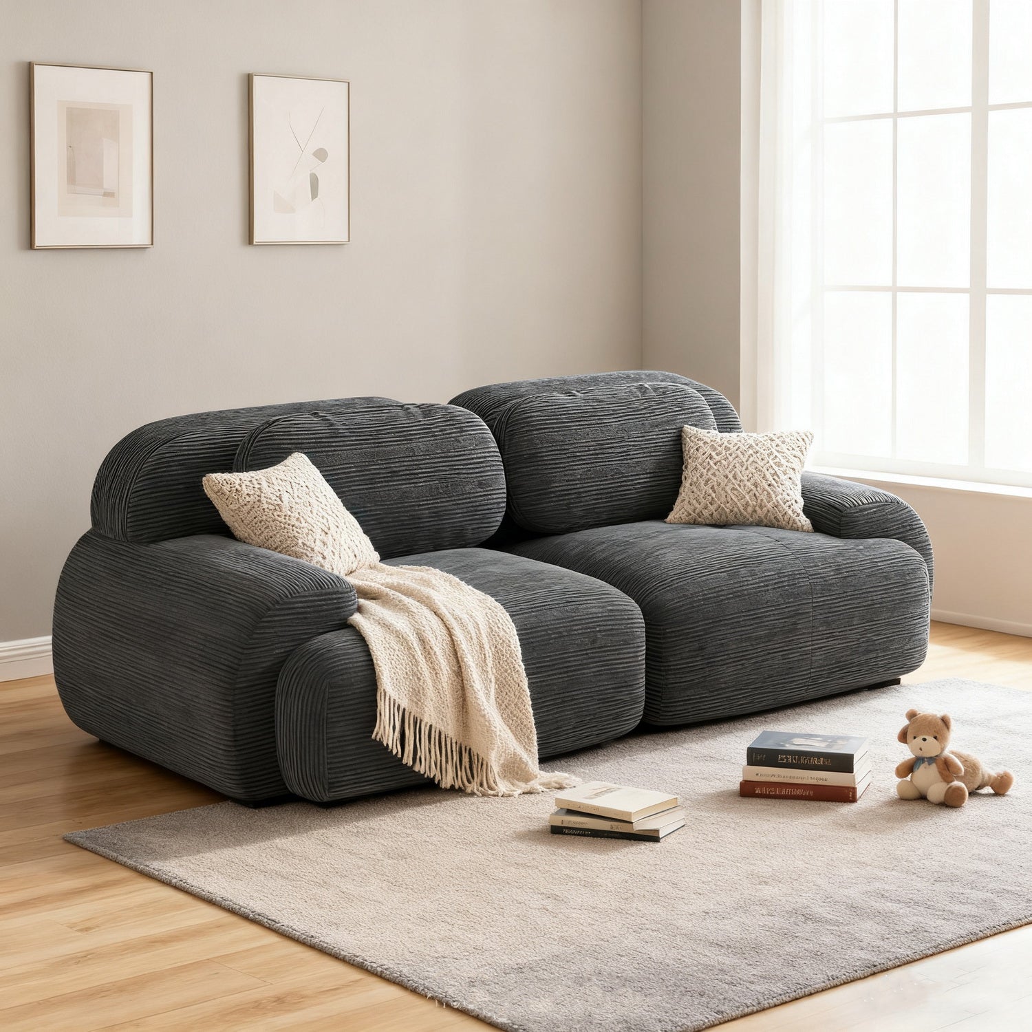 2-seater sofa bed in dark gray fabric with side pockets, modern convertible sofa