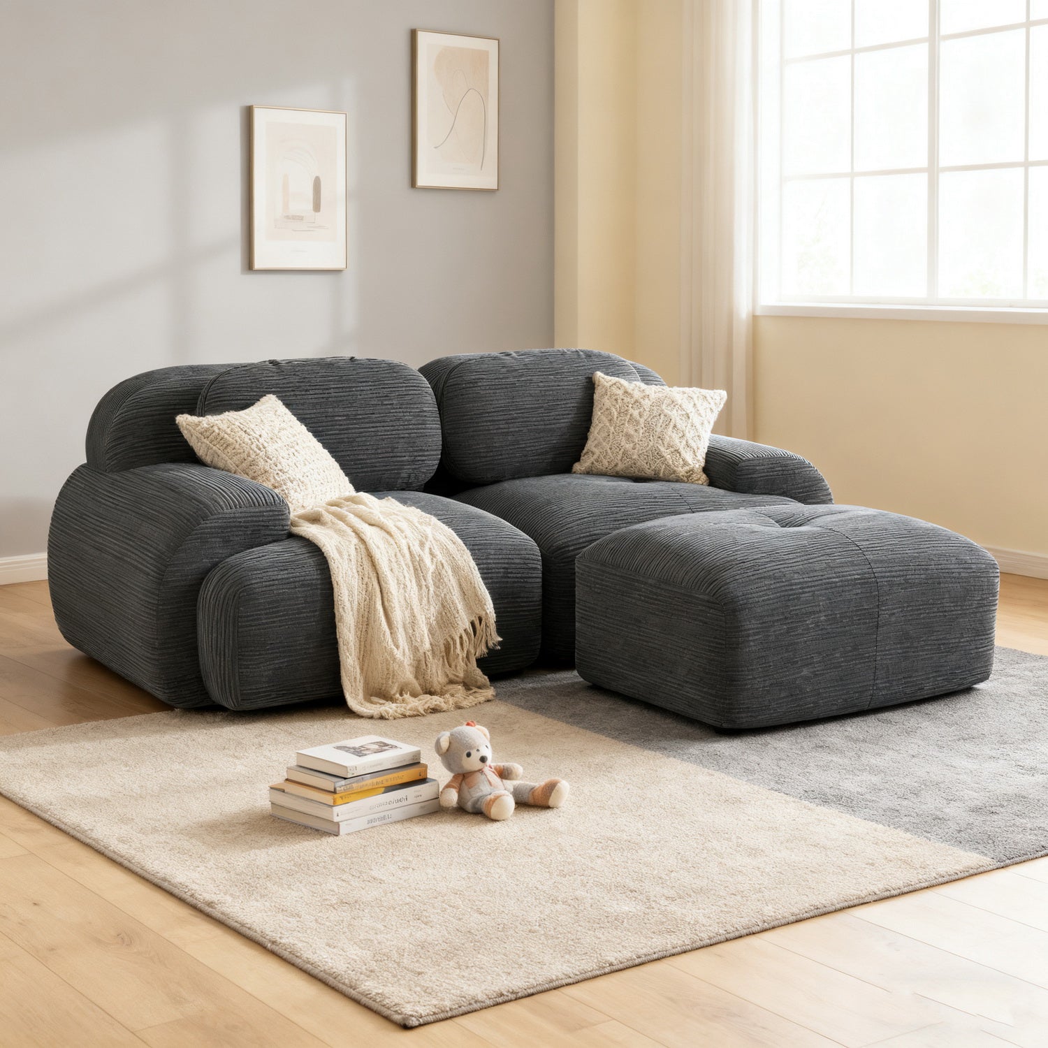 2-seater sofa bed in dark gray fabric with side pockets, modern convertible sofa