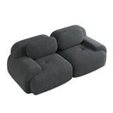 2-seater sofa bed in dark gray fabric with side pockets, modern convertible sofa