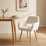 Chaise de salle à manger de style scandinave en fausse fourrure blanche avec pieds en métal effet bois