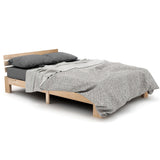 Lit double 140x200 cm en bois massif de pin naturel avec sommier à lattes et tête de lit, structure robuste et design intemporel, sans matelas.