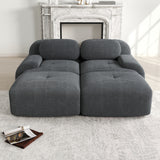 2-seater sofa bed in dark gray fabric with side pockets, modern convertible sofa