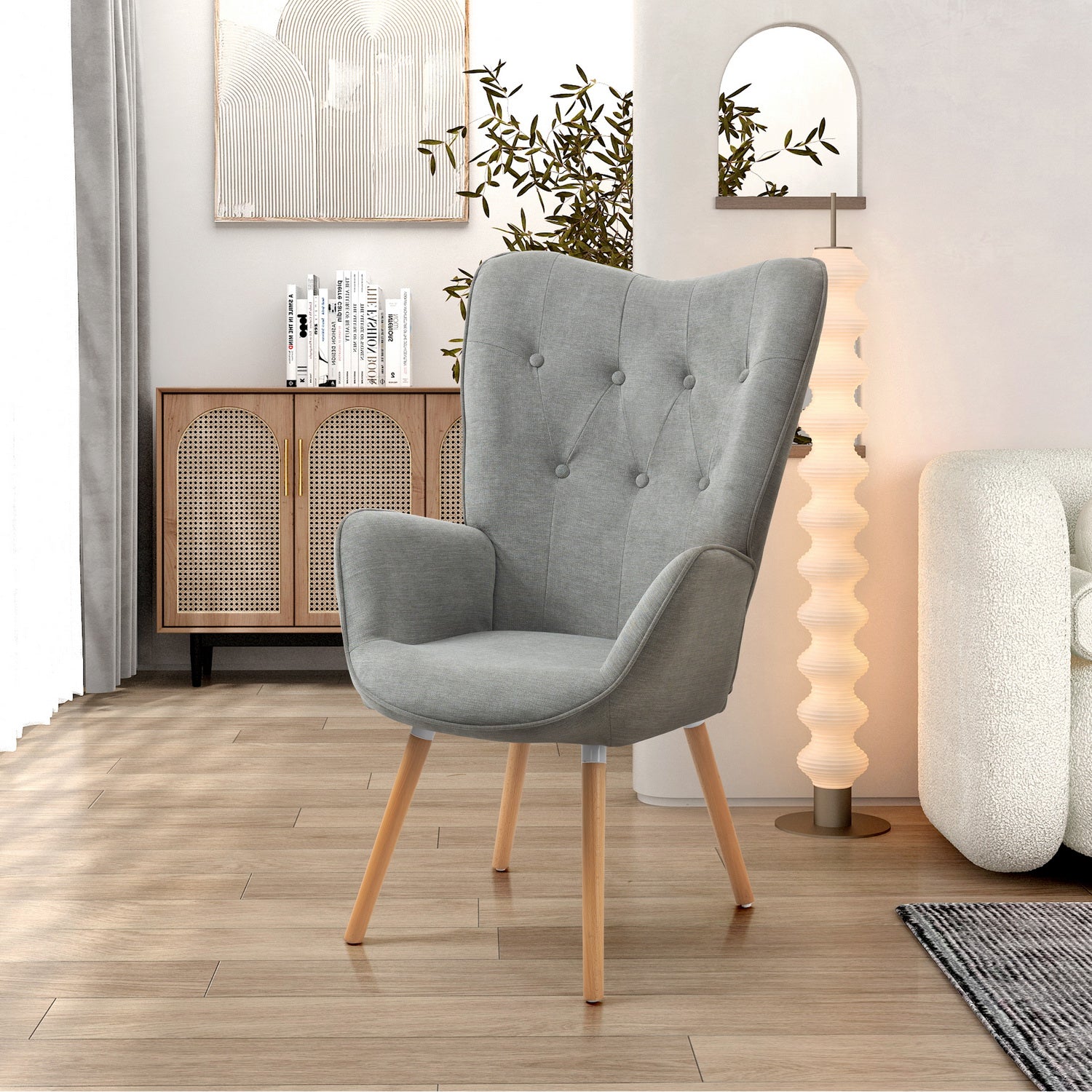 Fauteuil scandinave avec accoudoirs en tissu gris capitonné - KAS