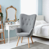 Fauteuil scandinave avec accoudoirs en tissu gris capitonné - KAS