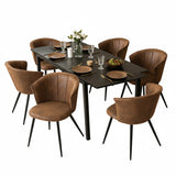 Ensemble table à manger extensible noire avec 6 fauteuils en suédine, style scandinave
