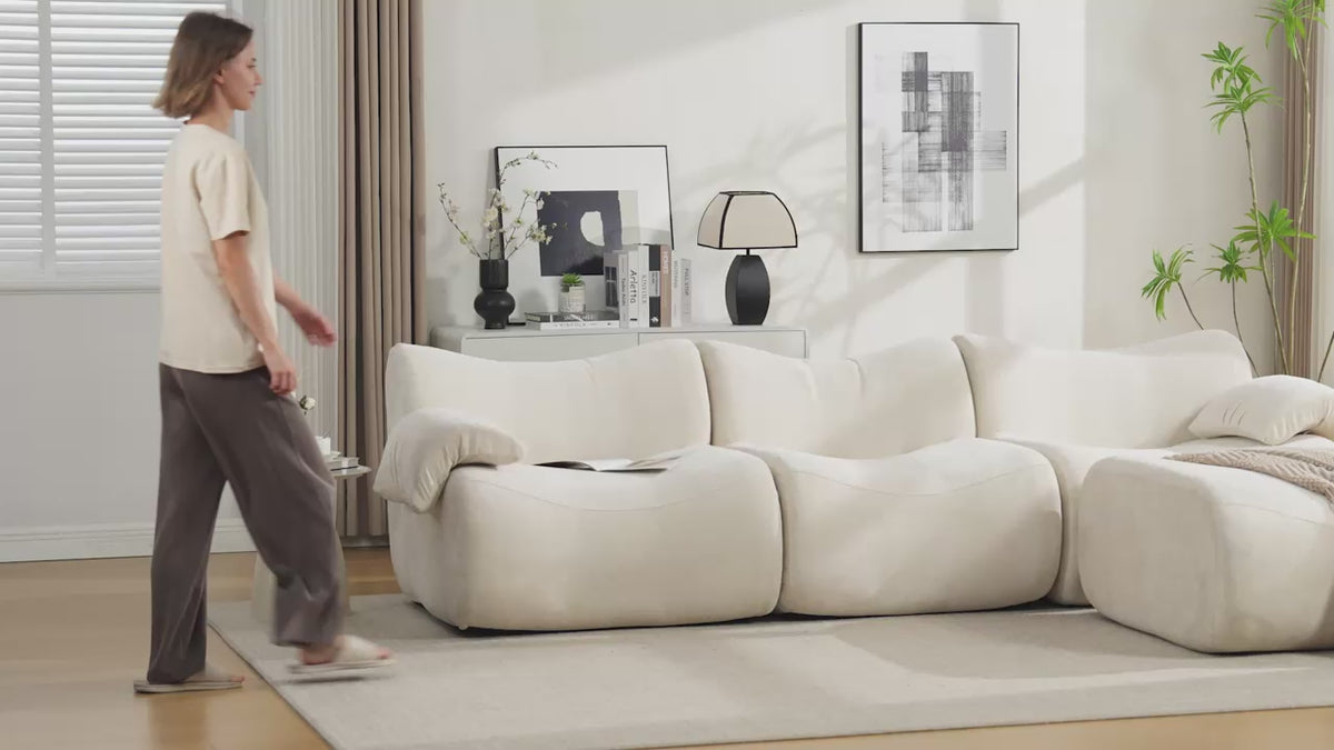 2-seater sofa bed in dark gray fabric with side pockets, modern convertible sofa